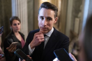 Sen. Josh Hawley speaks to reporters.