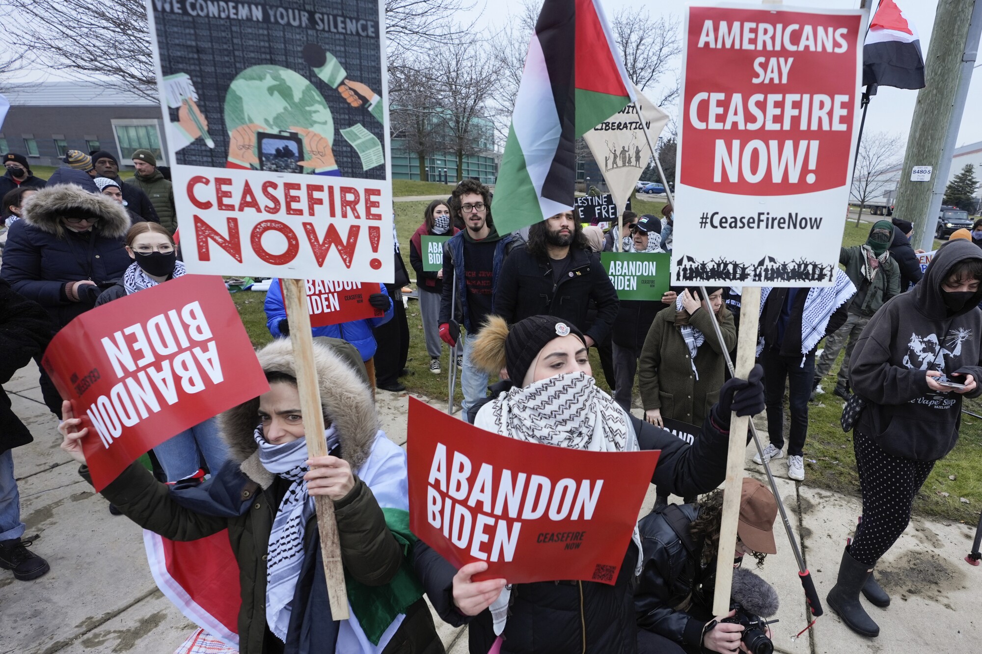 Pro-Palestinian demonstrators march during a visit by President Joe Biden in Warren, Mich., Thursday, Feb. 1, 2024.