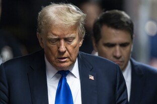 Former President Donald Trump arrives to the courthouse as the jury in his criminal trial is scheduled to continue deliberations at Manhattan Criminal Court.