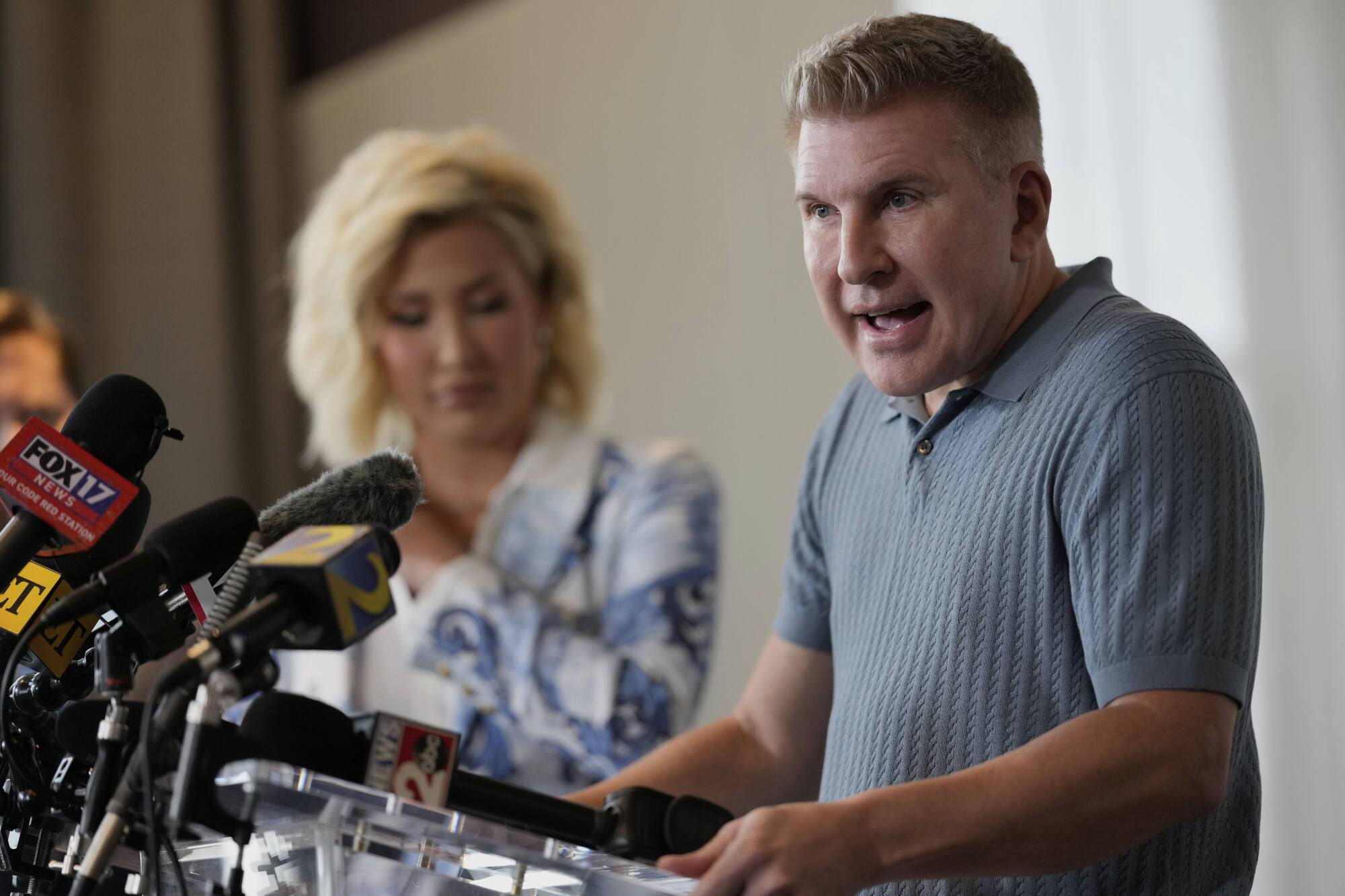 Reality television star Todd Chrisley speaks to reporters.
