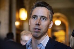 Sen. Josh Hawley speaks with reporters.