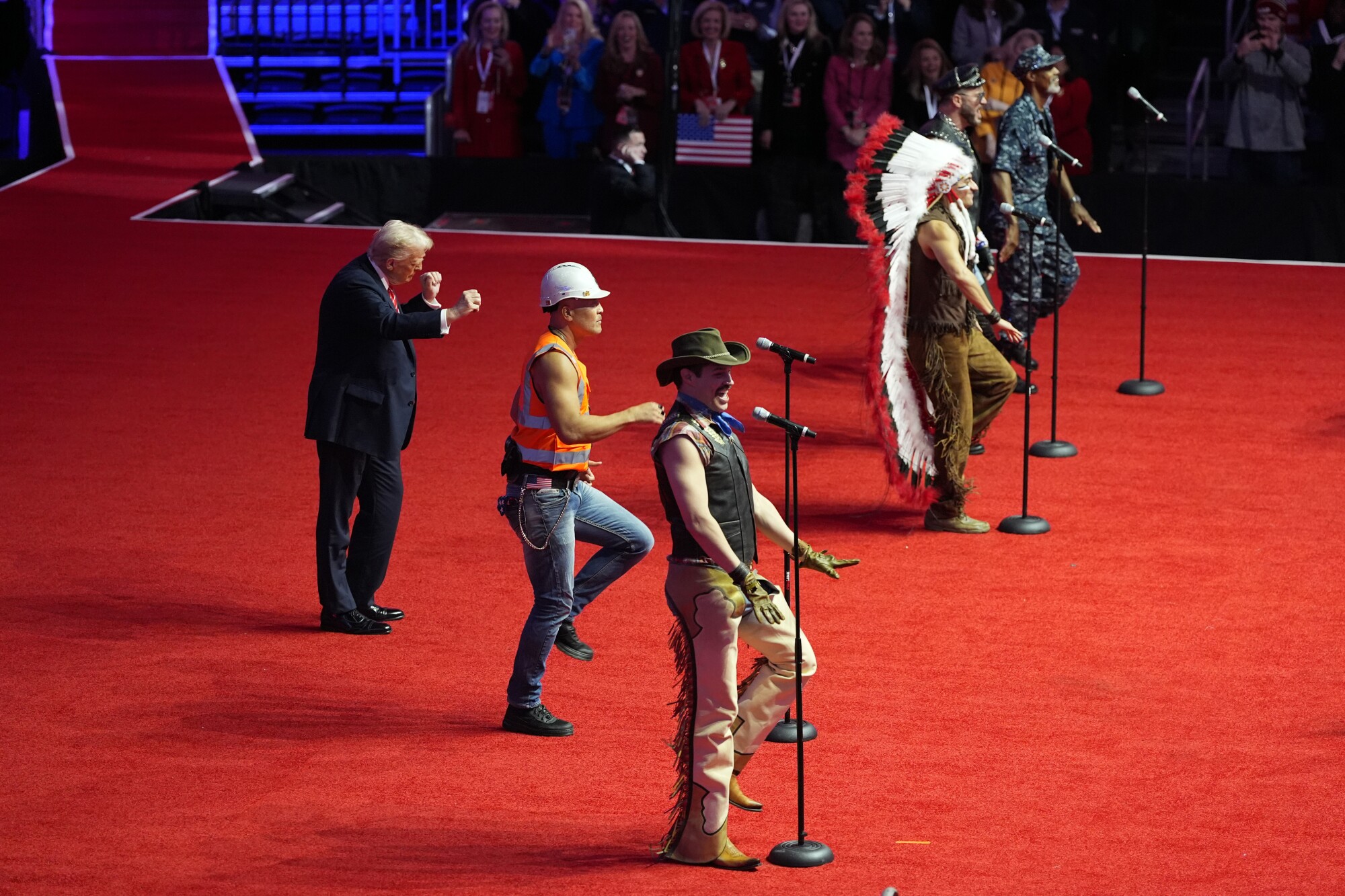 Members of the Village People performs "Y.M.C.A" with President-elect Donald Trump.