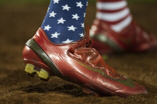 U.S. Rep. Fred Upton, R-Mich., wears patriotic socks as he participates in the 57th Congressional Baseball Game at National's Park in Washington, Thursday, June 14, 2018.