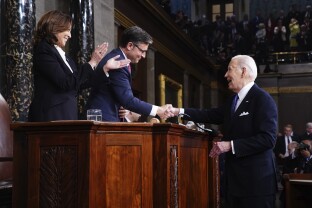 President Joe Biden, from right, greets House Speaker Mike Johnson, R- La.