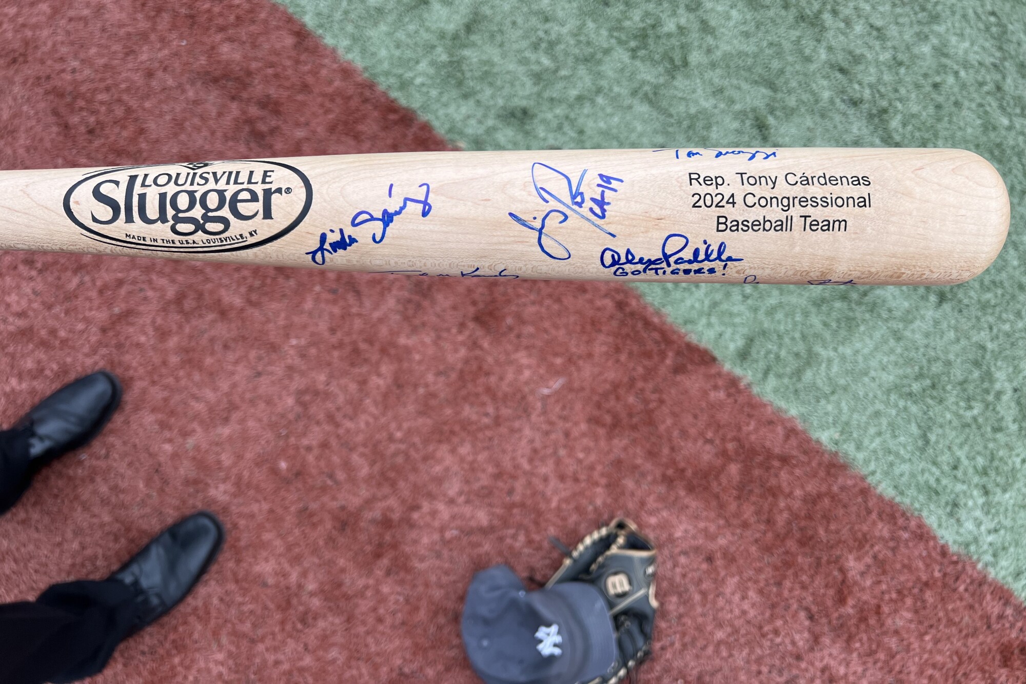 CA Rep Tony Cárdenas' bat, signed by members of the Democrats' roster during a morning baseball practice.