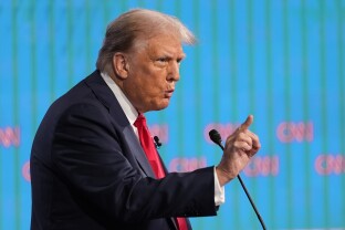 Republican presidential candidate former President Donald Trump speaks during a presidential debate.