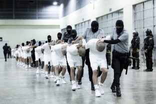 El Salvador presidential press office photo of migrants in prison.