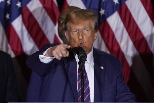 Former President Donald Trump pointing