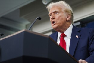 President Donald Trump speaks during a press conference on the midair collision.