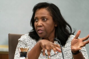 Board of Governors of the Federal Reserve member Lisa Cook at a meeting.