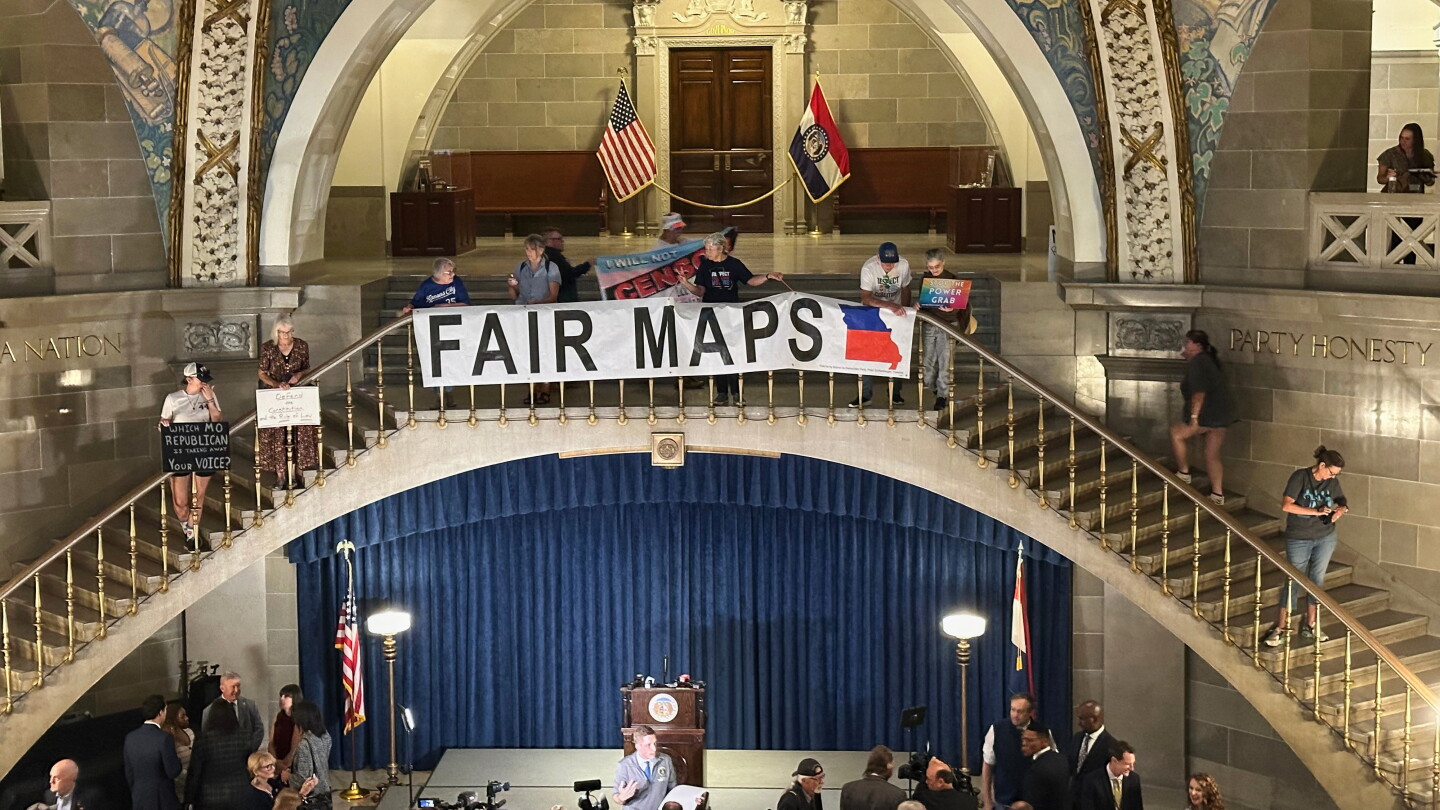 Photo: notus.org Opponents of Missouri's Republican-backed congressional redistricting plan display a banner in protest at the State Capitol