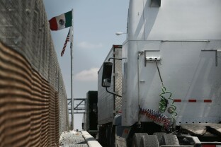 Shipping trucks waiting at the border.