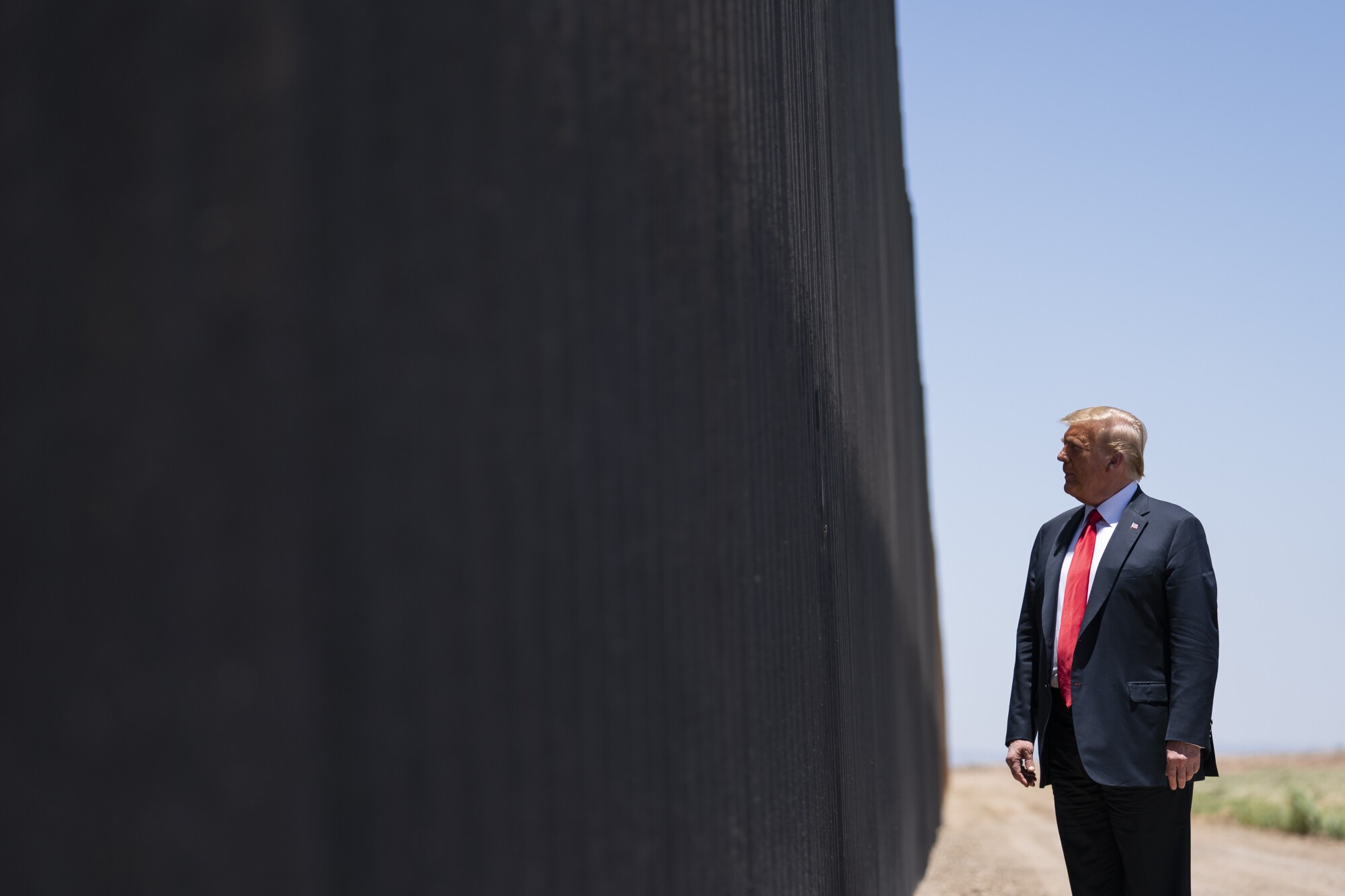 Donald Trump tours a section of the border wall in San Luis, Ariz