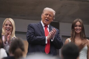 President Donald Trump attends the men's singles final of the U.S. Open tennis championships