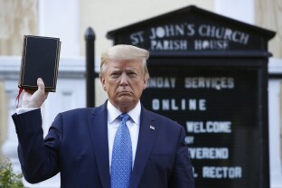 Donald Trump holds a Bible