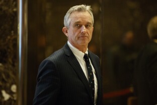 Robert F. Kennedy Jr. arrives in the lobby of Trump Tower in New York, Tuesday, Jan. 10, 2017.