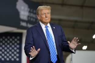 Trump dances at a campaign event at Dane Manufacturing.