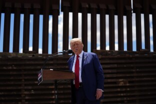 Donald Trump speaks along the southern border with Mexico.