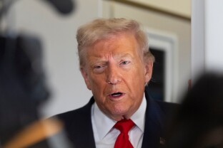 President Donald Trump speaks to the media.