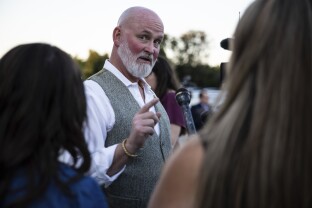 Rep. Derrick Van Orden speaks with reporters.